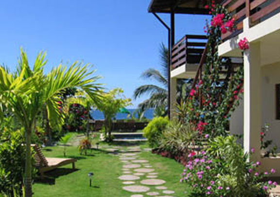 Busy Oceanfront Surf Lodge for Sale Right On the Beach in Jaco